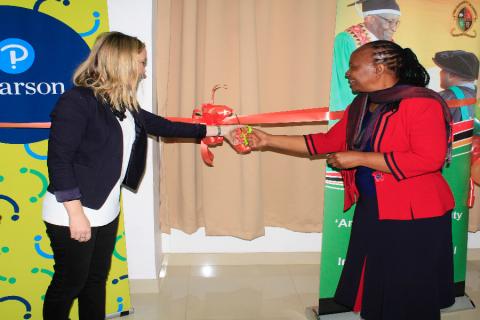 Acting Vice-Chancellor Prof Enala Mwase and Pearson International Head of Business Development, Ms Christine Hayes cutting the ribon during the launch