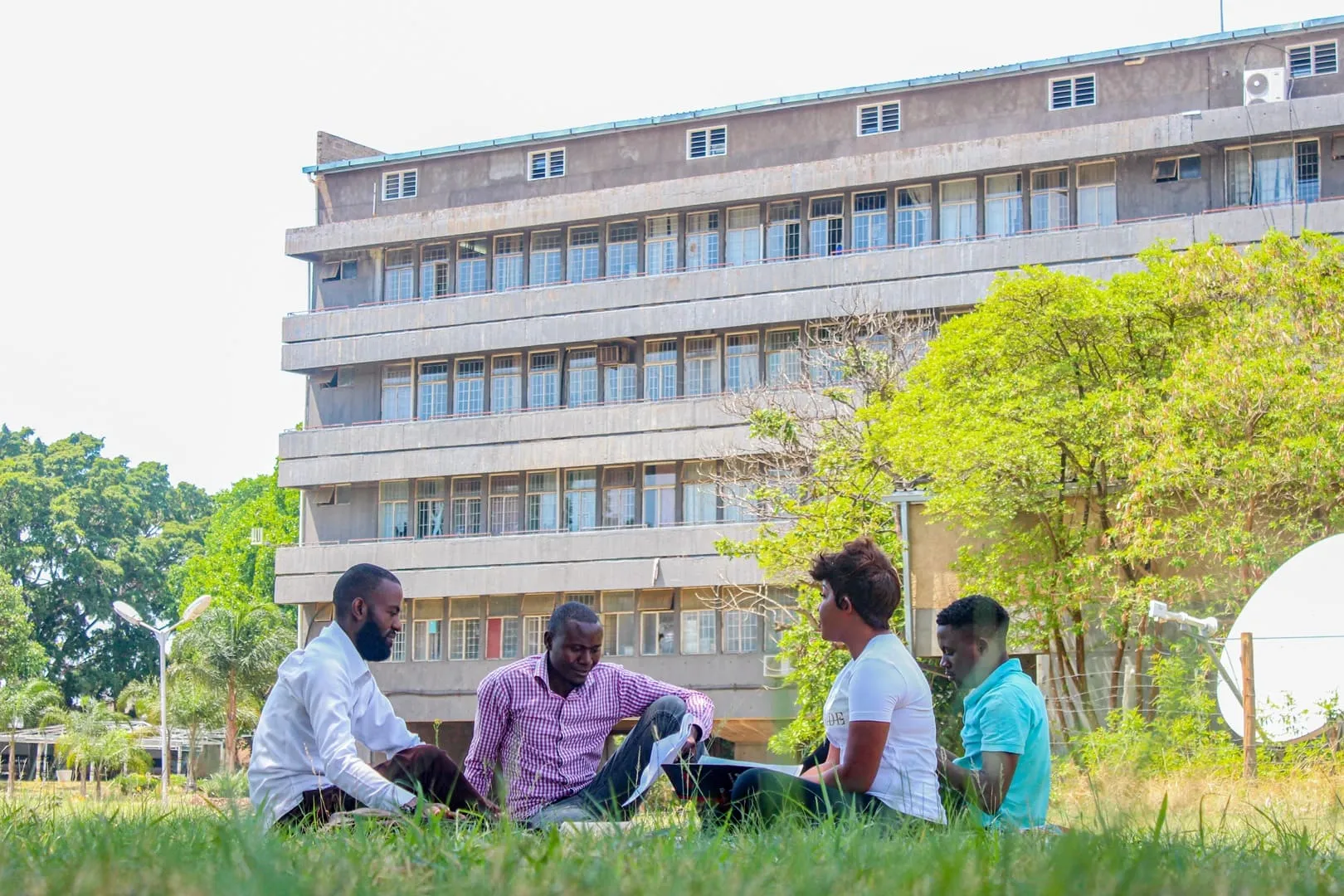 People in front of the university building
